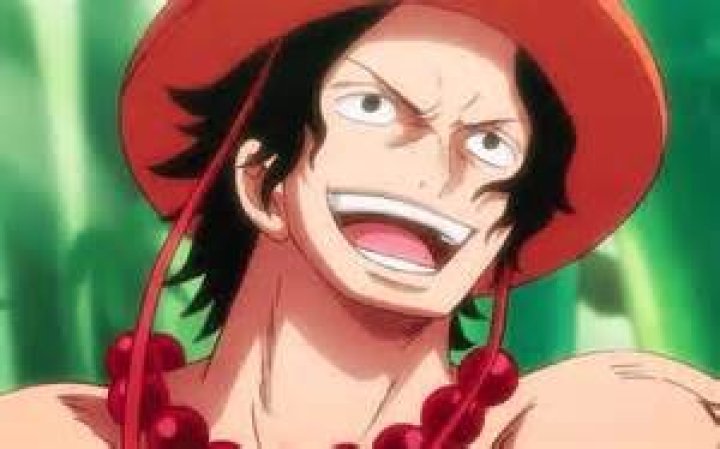 Ace smiling in One Piece, with flames surrounding him
