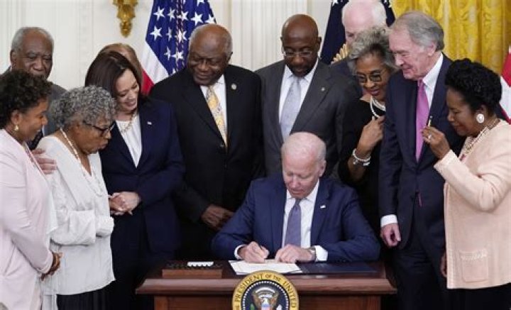 Biden signs Juneteenth holiday into law